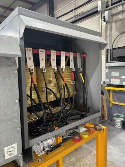 112.5 kVA dry-type commercial transformer installation with primary and secondary feeders